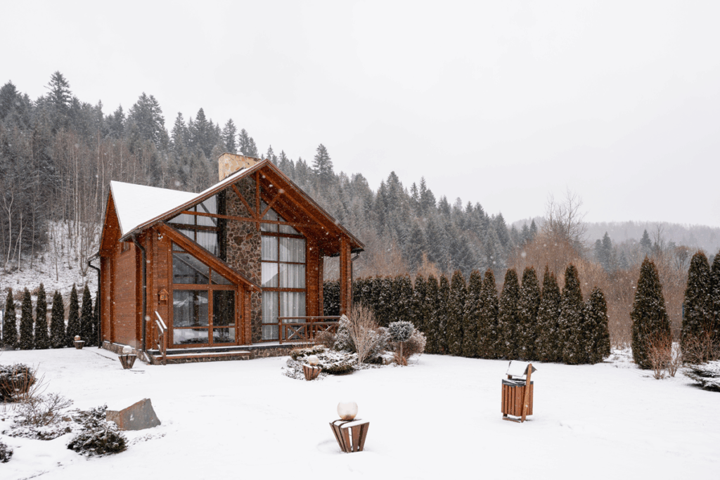 Luxury-custom-home-in-Mapleton-Utah-blending-with-mountain-landscape-in-winter - Summit Construction